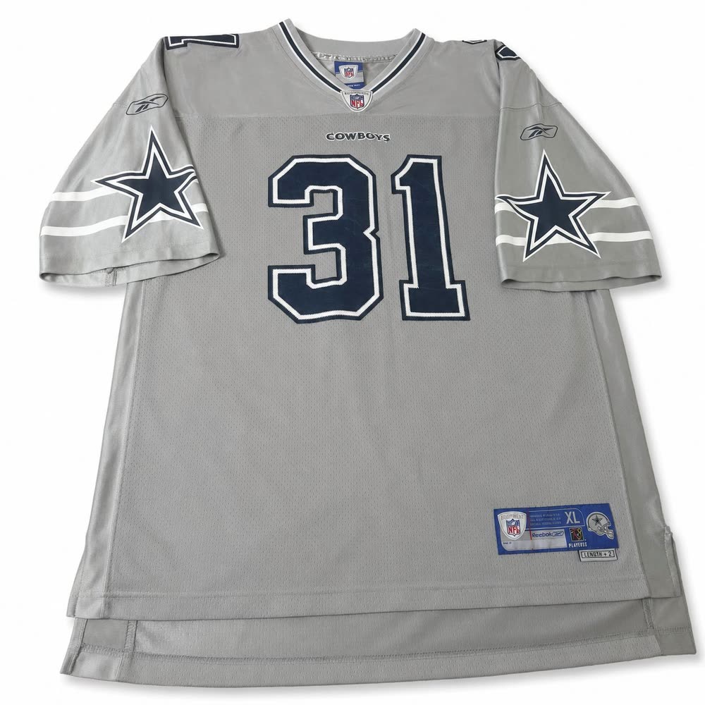 The same jersey on a clean white background with a soft shadow, with the same creases and the same size tag.